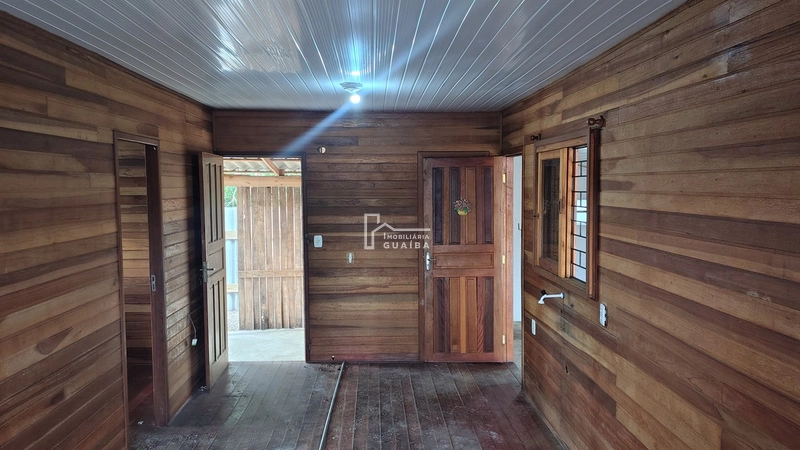 Bela casa de madeira á venda no bairro Jardim dos Lagos -Guaíba -RS: 25ª foto da galeria de imagens do imóvel
