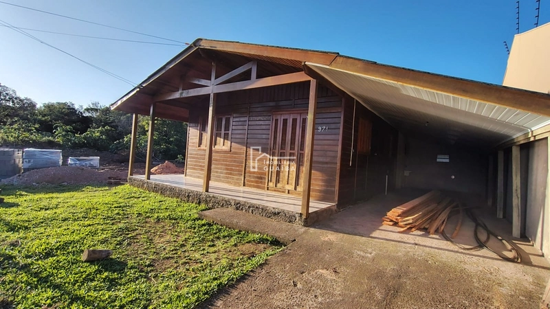 Bela casa de madeira á venda no bairro Jardim dos Lagos -Guaíba -RS: 4ª foto da galeria de imagens do imóvel