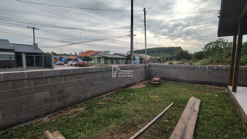 Bela casa de madeira á venda no bairro Jardim dos Lagos -Guaíba -RS: 29ª foto da galeria de imagens do imóvel