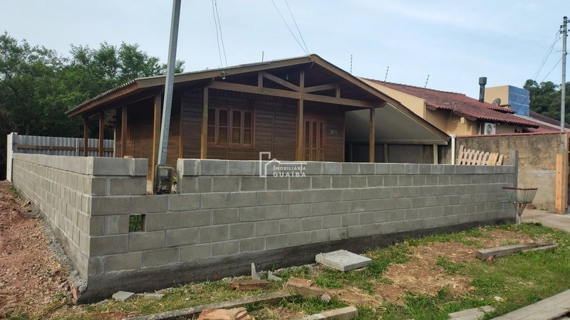 Bela casa de madeira á venda no bairro Jardim dos Lagos -Guaíba -RS: 14ª foto da galeria de imagens do imóvel