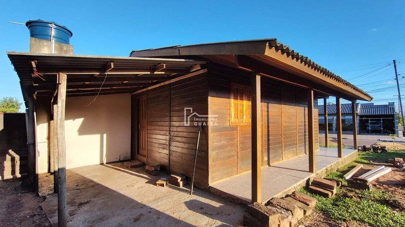 Bela casa de madeira á venda no bairro Jardim dos Lagos -Guaíba -RS: 6ª foto da galeria de imagens do imóvel