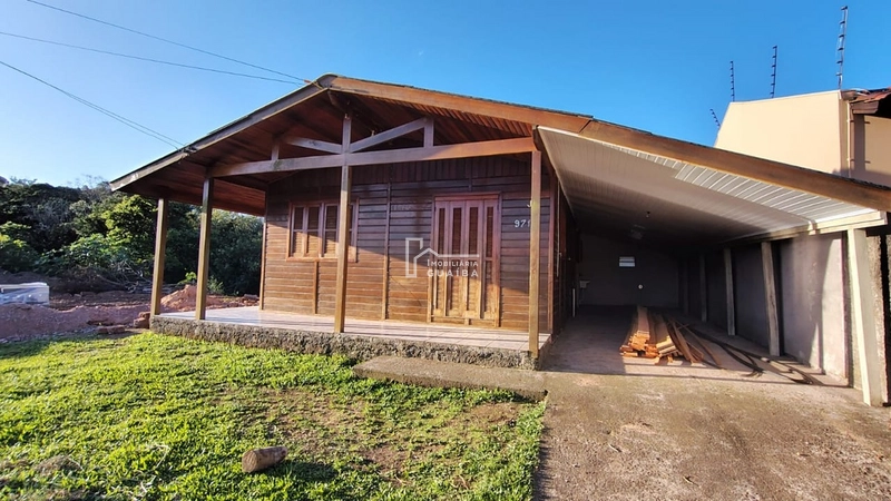 Bela casa de madeira á venda no bairro Jardim dos Lagos -Guaíba -RS: 2ª foto da galeria de imagens do imóvel