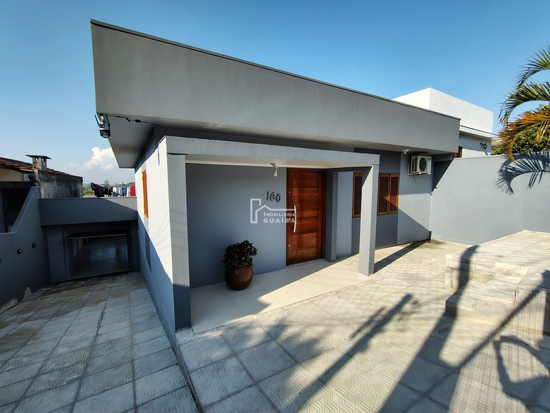 EXCELENTE CASA A VENDA NO BAIRRO CEL NASSUCA - GUAIBA .: 1ª foto da galeria de imagens do imóvel