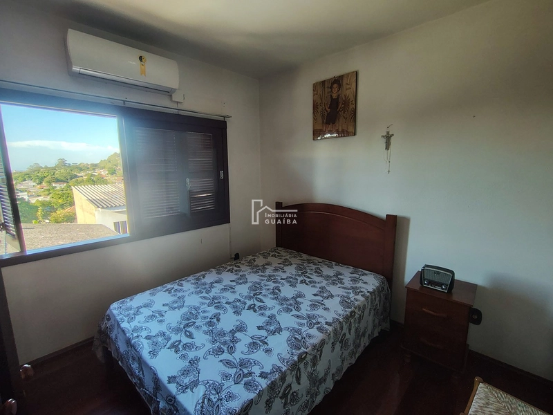 EXCELENTE CASA A VENDA NO BAIRRO CEL NASSUCA -GUAIBA -RS: 30ª foto da galeria de imagens do imóvel