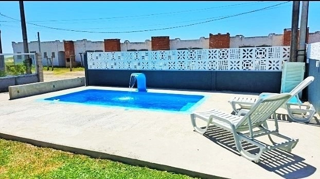 C-440 - PISCINA E INTERNET, 3D DE CASAL (1 suíte), 40m do mar: 3ª foto da galeria de imagens do imóvel