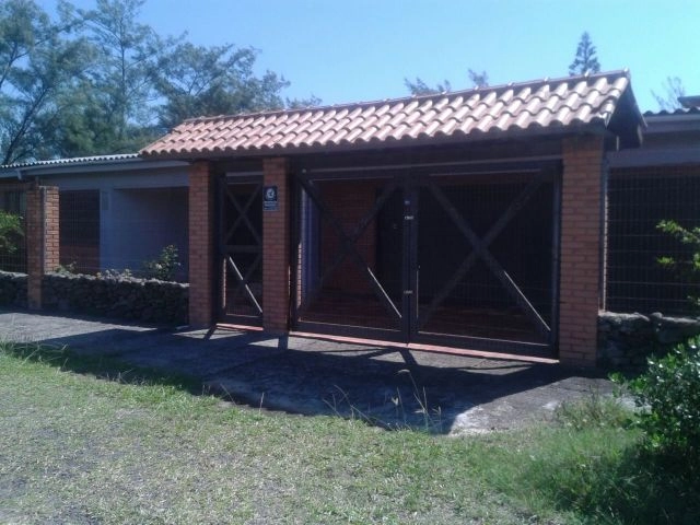 Excelente casa dois terrenos junto ao mar em Capão da Canoa: 1ª foto da galeria de imagens do imóvel