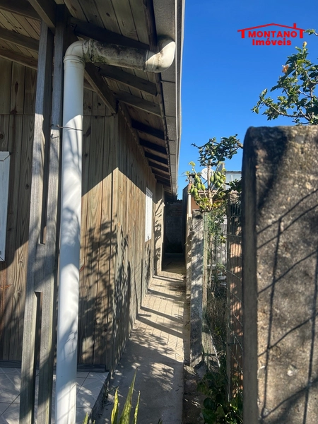 Casa c/ 3 dormitórios há 2 quadras do mar em Capão da Canoa: 2ª foto da galeria de imagens do imóvel