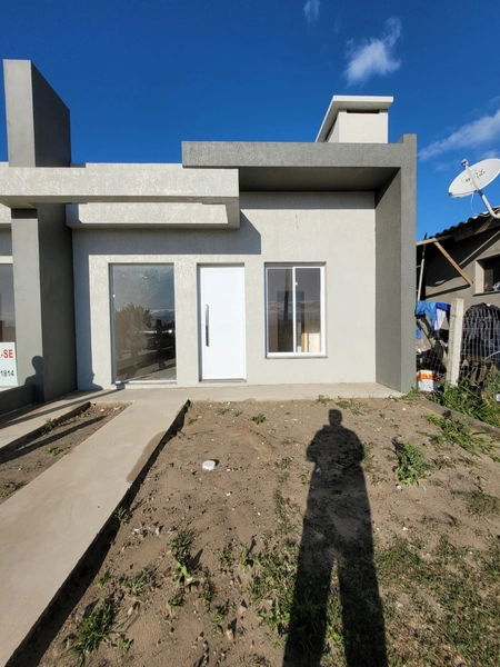 CASA GEMINADA ACONCHEGANTE- JARDIM BEIRA MAR: 2ª foto da galeria de imagens do imóvel