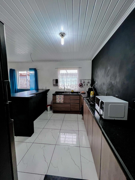 Casa com anexo nos fundos em Capão da Canoa: 6ª foto da galeria de imagens do imóvel