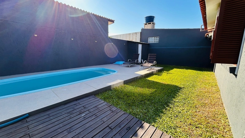 Casa 3 dormitórios poucos metros do mar!: 7ª foto da galeria de imagens do imóvel