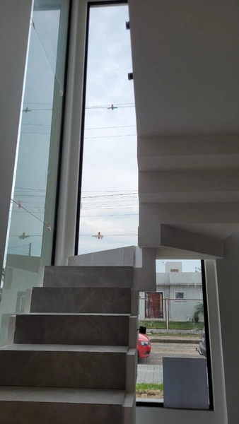 EXCELENTE SOBRADO DE ESQUINA COM TRÊS DORMITÓRIOS- LADO MAR: 8ª foto da galeria de imagens do imóvel