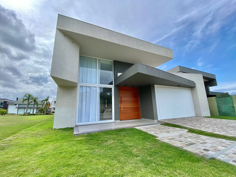 Casa com 4 suítes e piscina no condomínio Ilhas Resort: 2ª foto da galeria de imagens do imóvel