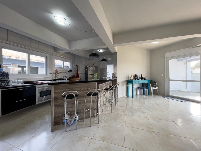 Casa com 5 dormitórios perto da praia no bairro Zona Norte: 26ª foto da galeria de imagens do imóvel