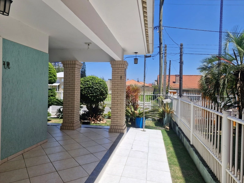 Casa a uma quadra do mar com 4 dormitórios: 9ª foto da galeria de imagens do imóvel