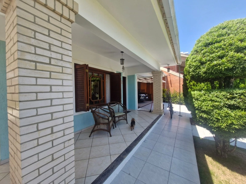Casa a uma quadra do mar com 4 dormitórios: 7ª foto da galeria de imagens do imóvel