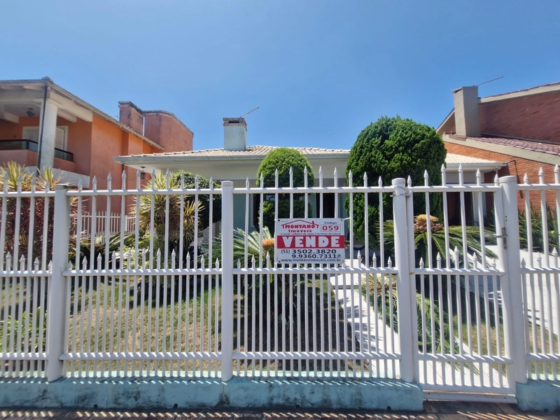 Casa a uma quadra do mar com 4 dormitórios: 1ª foto da galeria de imagens do imóvel
