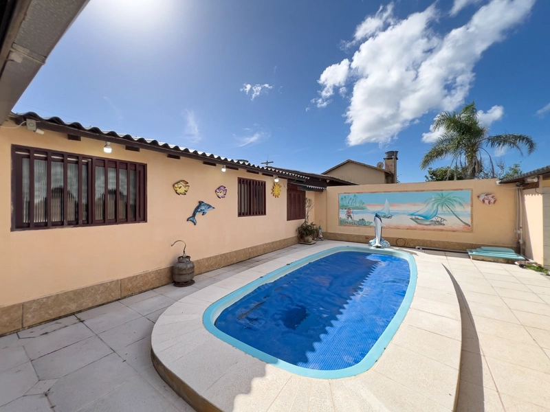 Casa com piscina e 3 dormitórios no bairro Jardim Beira Mar: 21ª foto da galeria de imagens do imóvel