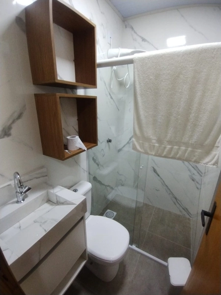 Casa com 3 dormitórios perto da praia e pátio amplo: 4ª foto da galeria de imagens do imóvel