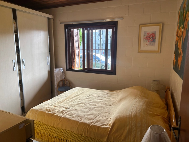 Casa com 4 dormitórios a 2 quadras do mar: 8ª foto da galeria de imagens do imóvel
