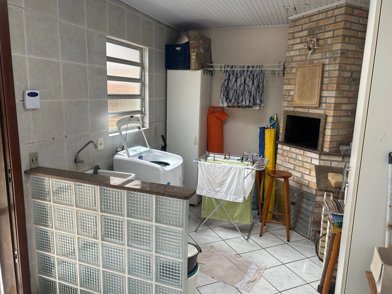 Casa com 4 dormitórios a 2 quadras do mar: 12ª foto da galeria de imagens do imóvel