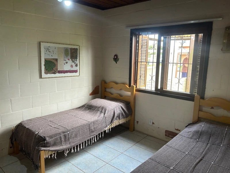 Casa com 4 dormitórios a 2 quadras do mar: 5ª foto da galeria de imagens do imóvel
