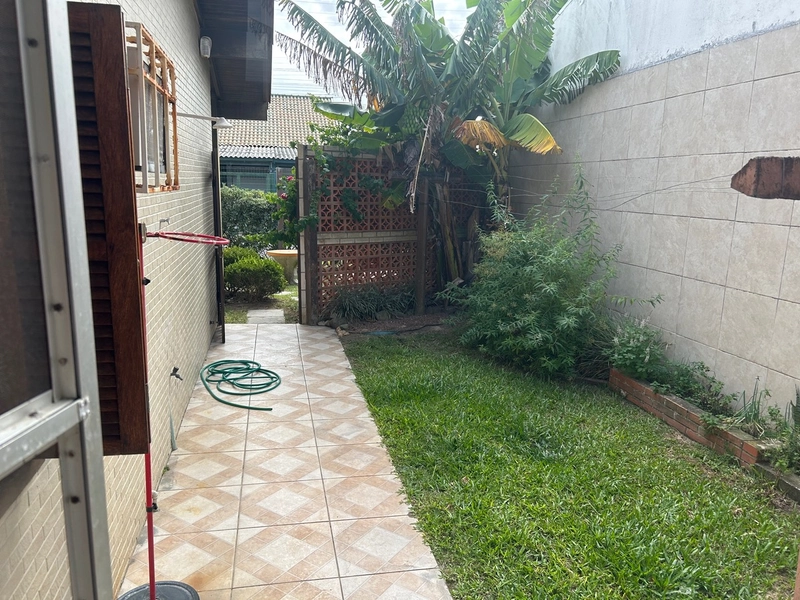 Casa com 4 dormitórios a 2 quadras do mar: 9ª foto da galeria de imagens do imóvel