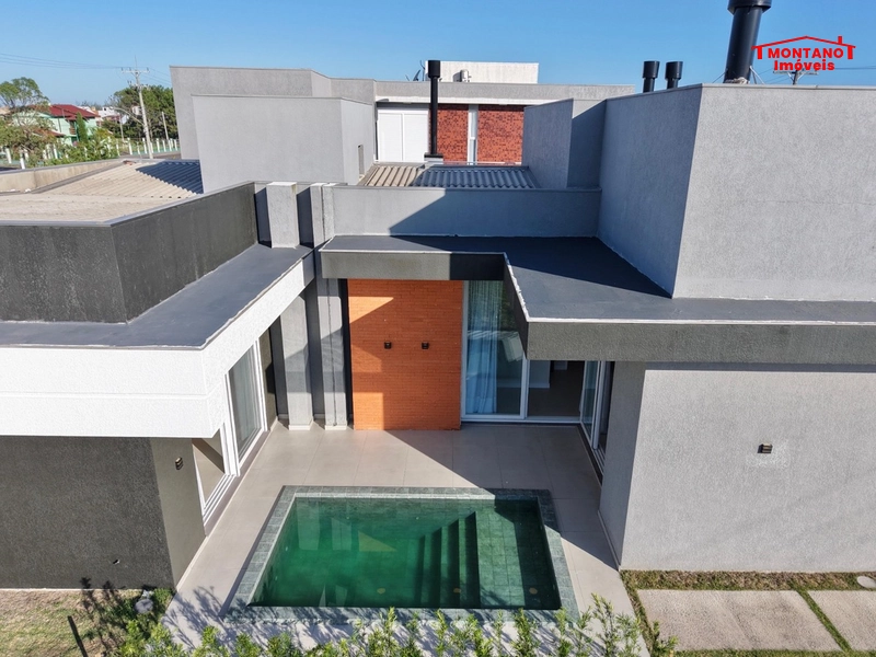 Casa de alto padrão com 4 suítes no condomínio Costa Serena