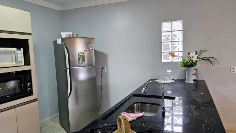 Casa aconchegante próxima ao mar com 2 dormitórios: 12ª foto da galeria de imagens do imóvel
