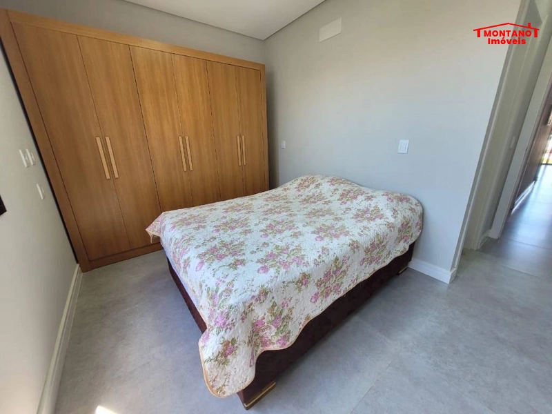 Casa de alto padrão com pé direito alto e dois dormitórios: 24ª foto da galeria de imagens do imóvel
