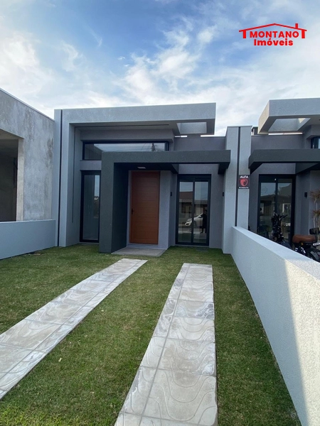 Casa de alto padrão com pé direito alto e dois dormitórios: 2ª foto da galeria de imagens do imóvel