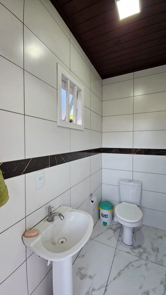 Casa com qualidade excepcional de 3 dormitórios e grande pátio!: 8ª foto da galeria de imagens do imóvel