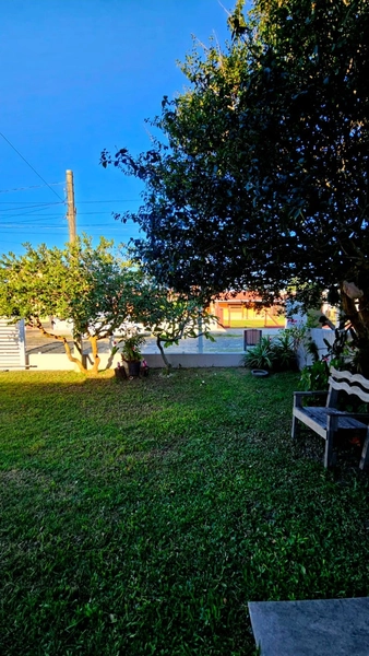 Casa com qualidade excepcional de 3 dormitórios e grande pátio!: 4ª foto da galeria de imagens do imóvel