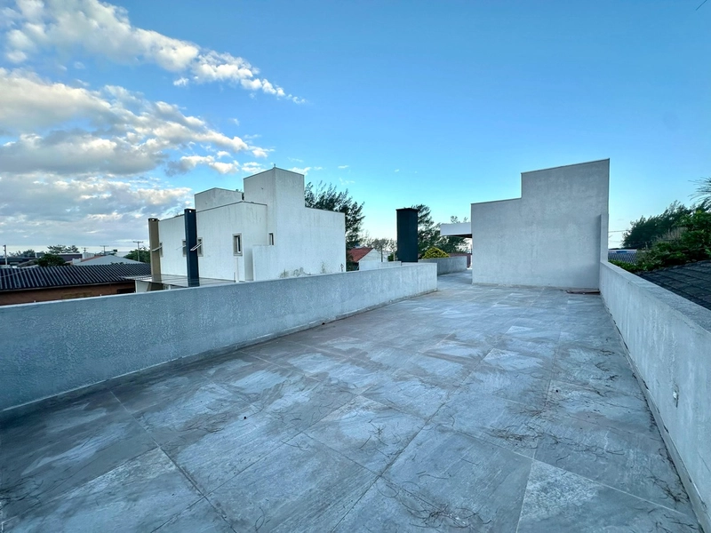 Casa de 3 dormitórios a 1 quadra do mar no bairro Zona Norte: 3ª foto da galeria de imagens do imóvel