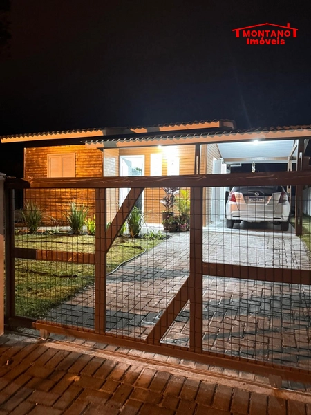 Charmoso chalé localizado em Capão Da Canoa: 1ª foto da galeria de imagens do imóvel