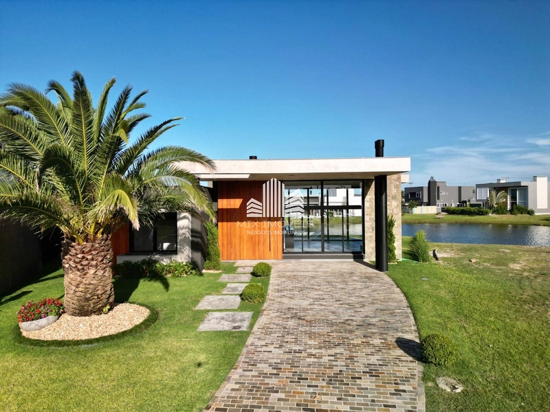 Excelente casa térrea beira lago, no condomínio Riviera Xangri-lá.: 2ª foto da galeria de imagens do imóvel