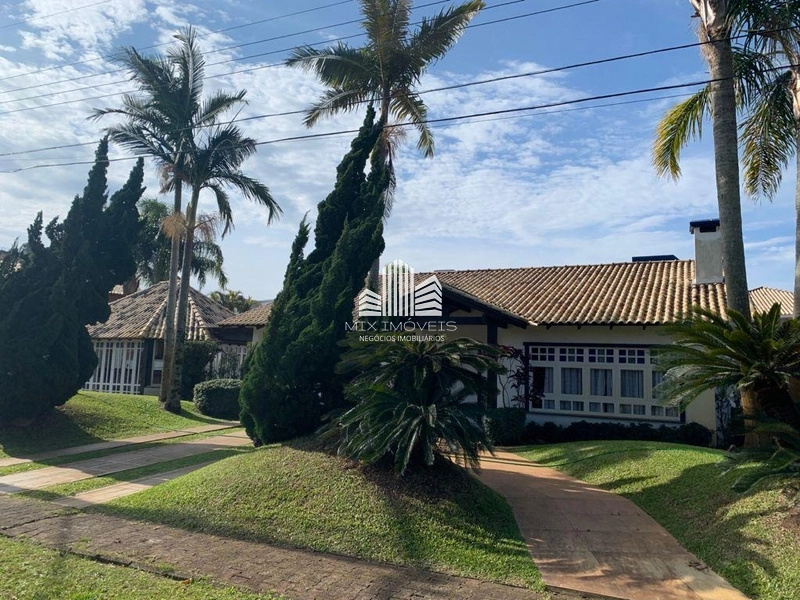 Linda casa estilo praiana no condomínio Atlântida Lagos Park.: 2ª foto da galeria de imagens do imóvel