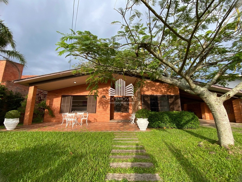 Excelente casa junto ao centrinho de Atlântida!: 2ª foto da galeria de imagens do imóvel
