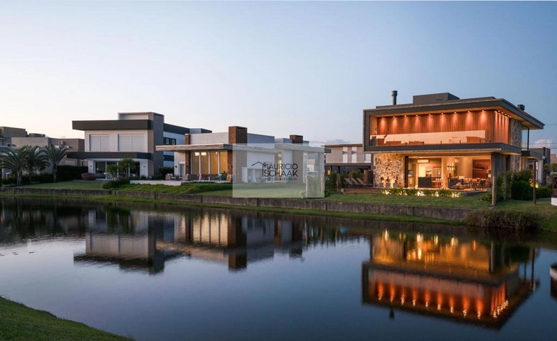Casa beira lago em condomínio fechado: 4ª foto da galeria de imagens do imóvel