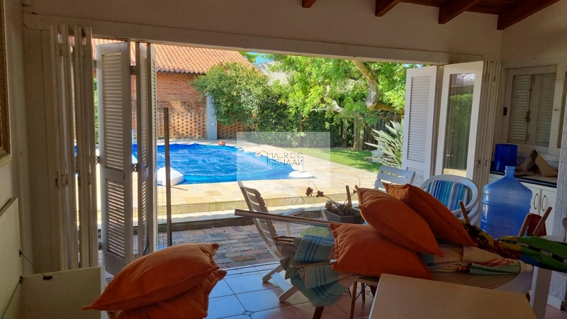 Casa à poucos metros do mar em Xangri-lá: 4ª foto da galeria de imagens do imóvel