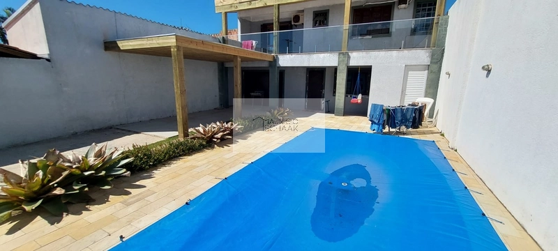 Casa com piscina no centro de Xangri-lá!: 1ª foto da galeria de imagens do imóvel