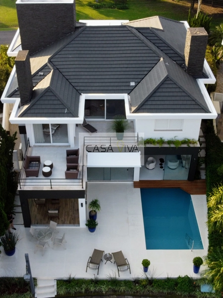 Mansão em condomínio fechado em Atlântida!: 3ª foto da galeria de imagens do imóvel