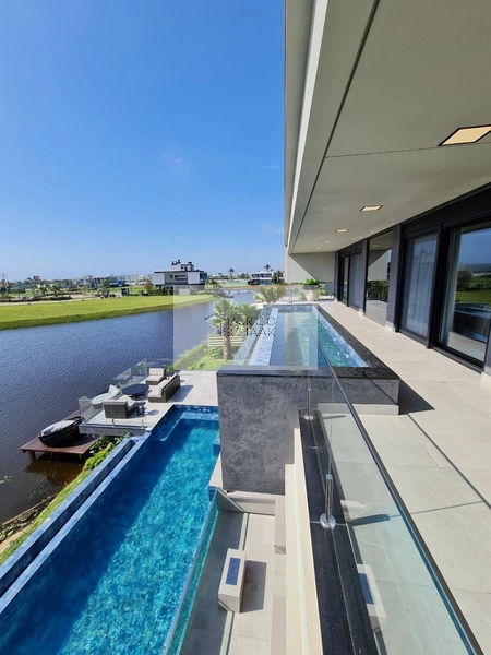 Mansão em condomínio fechado no litoral: 24ª foto da galeria de imagens do imóvel