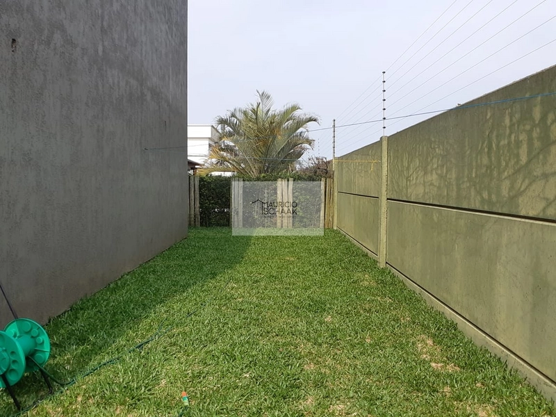 Casa em condomínio fechado em Atlântida: 35ª foto da galeria de imagens do imóvel