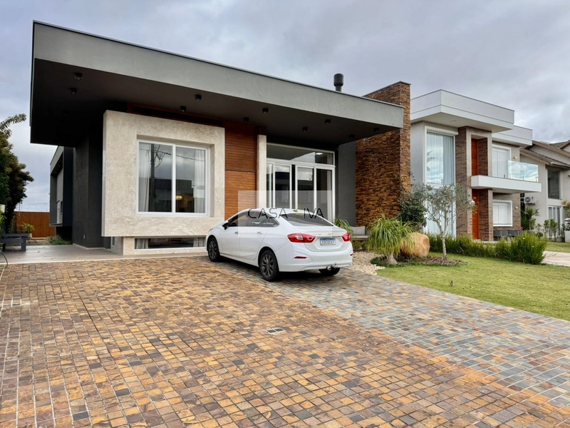 Casa em condomínio fechado em Atlântida: 2ª foto da galeria de imagens do imóvel