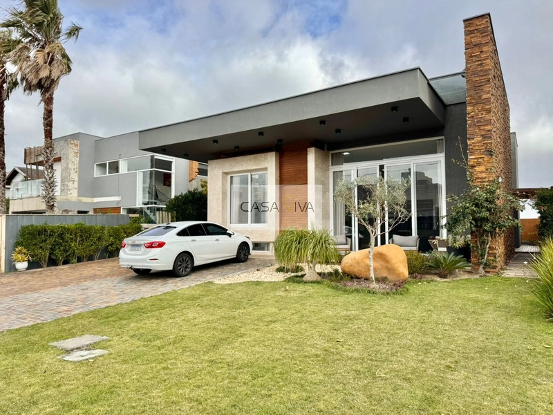 Casa em condomínio fechado em Atlântida: 3ª foto da galeria de imagens do imóvel