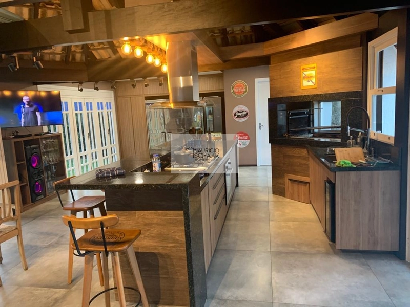 Casa com 2 terrenos e meio em condomínio de Atlântida: 3ª foto da galeria de imagens do imóvel