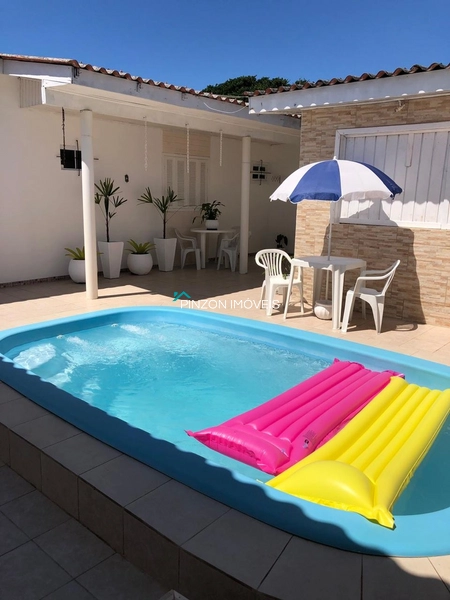 CASA COM PISCINA EM XANGRI-LÁ: 5ª foto da galeria de imagens do imóvel