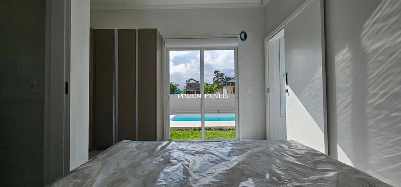 CASA COM 03 DORMITÓRIOS E PISCINA NO BALNEÁRIO VISTA ALEGRE: 24ª foto da galeria de imagens do imóvel