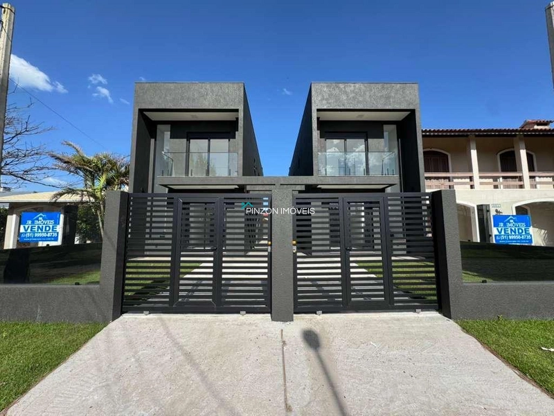 SOBRADO GEMINADO A 150M DA PRAIA: 1ª foto da galeria de imagens do imóvel