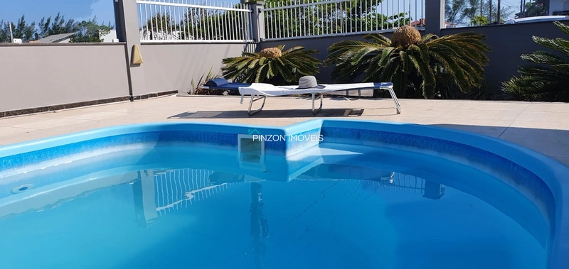 BELA CASA DE ESQUINA COM PISCINA AQUECIDA EM ARROIO DO SAL...: 8ª foto da galeria de imagens do imóvel